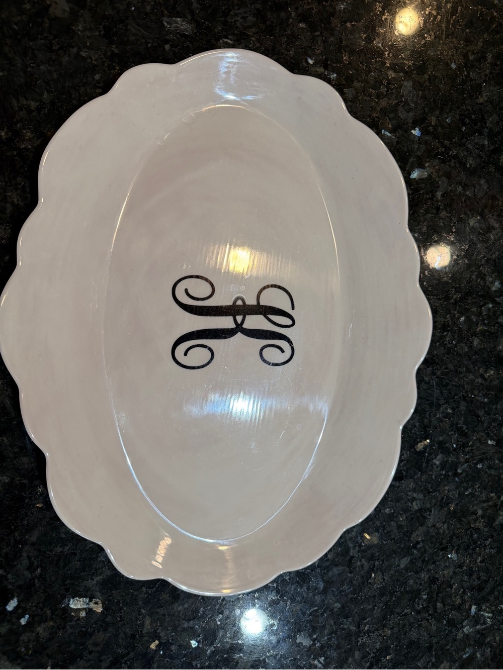 Scalloped Edge beige plastic decorative Platter with Black Monogram